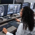 Doctors Working With Computer And Analyzing Medical Scans